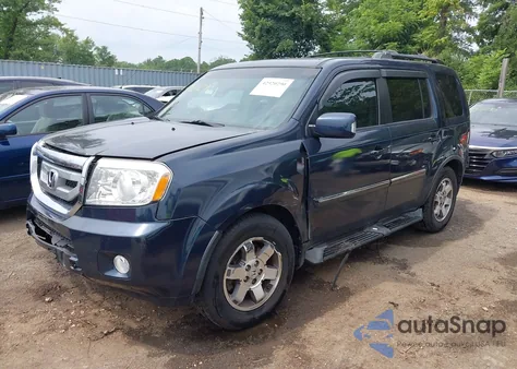 2011 Honda Pilot Touring z USA, uszkodzony, nr VIN 5FNYF4H93BB072200